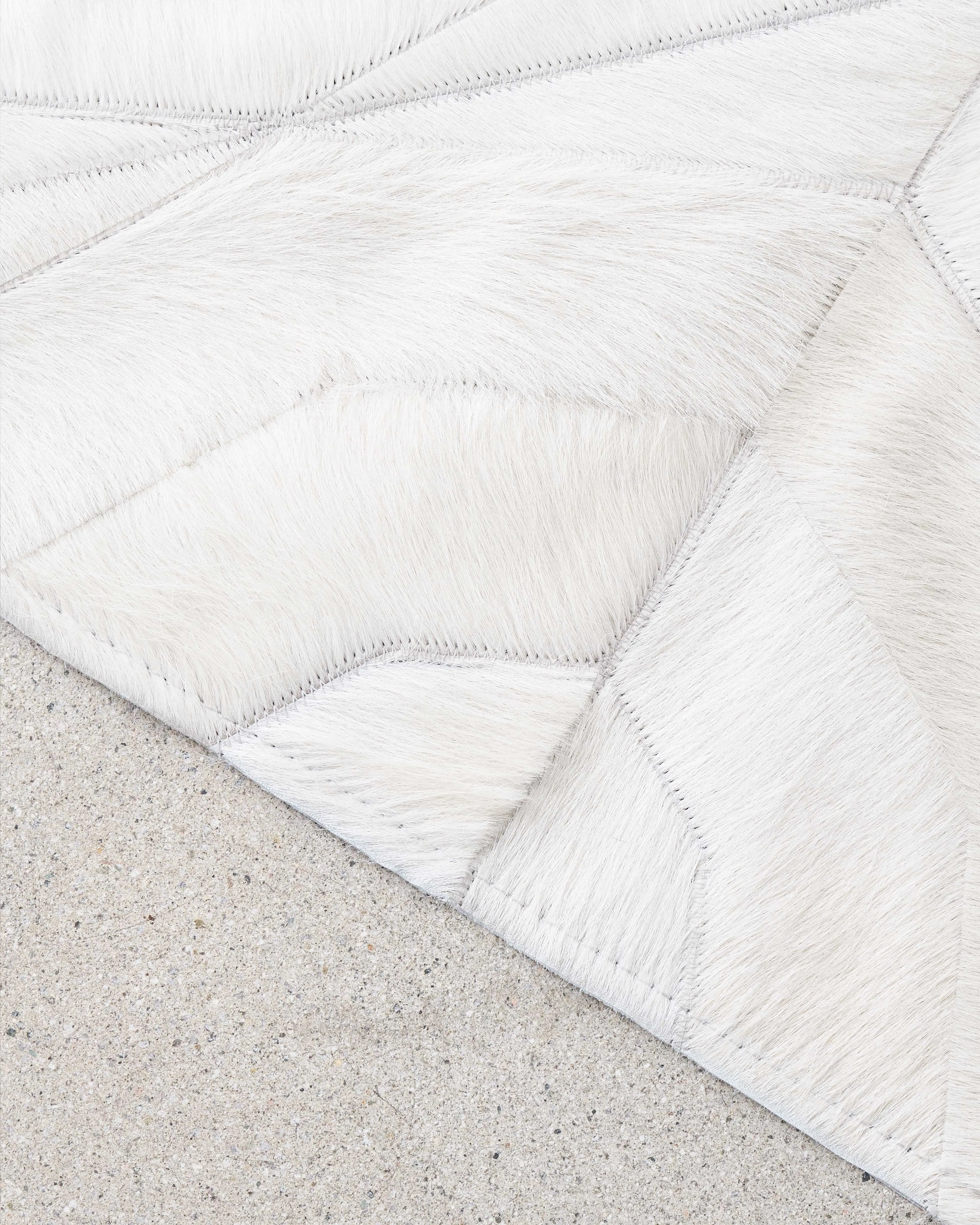 Tofer Cowhide Rug in Ivory